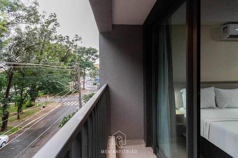 Balcony, tree-lined view near Av. Santo Amaro