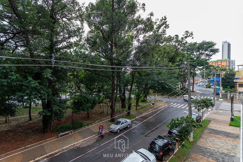 Balcony, tree-lined view near Av. Santo Amaro