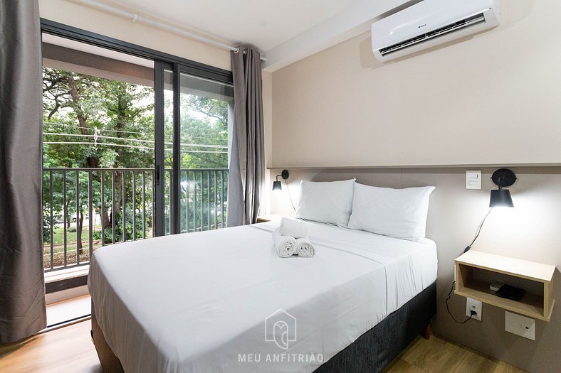 Balcony, tree-lined view near Av. Santo Amaro