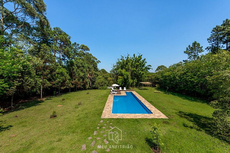 Farmstead with garden and pool on top of mountains