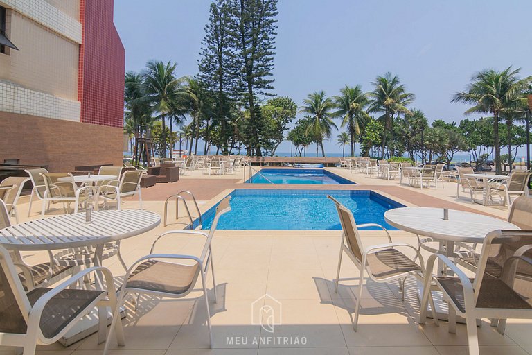 Pé na areia e vista para praia na Barra da Tijuca