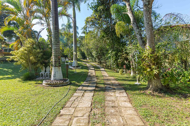 Pool, garden, gourmet area and tree-lined view