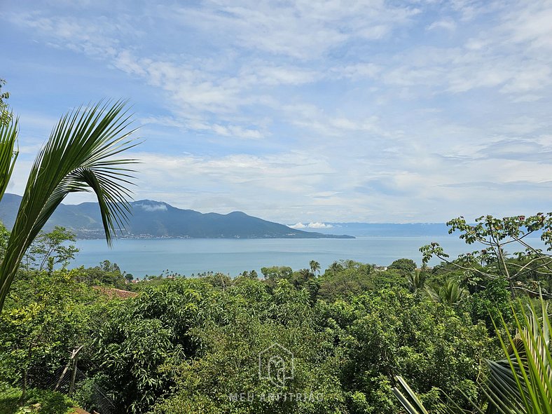 Suíte com vista para o mar perto do centrinho