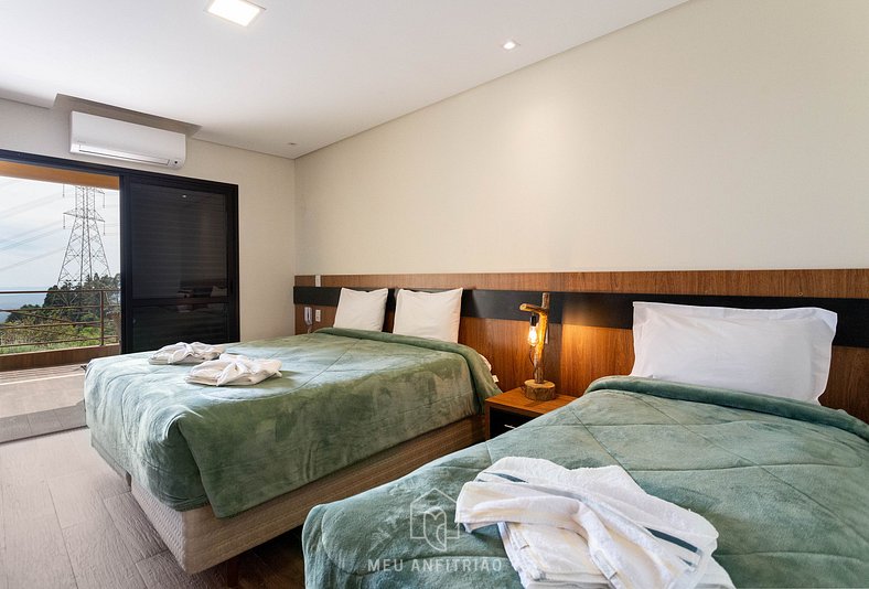 Suite with minibar and TV in Serra da Cantareira